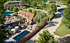 Villa Pauli i Djursholm med pool, terrasser, uteservering och grönskande omgivning vid vattnet.
